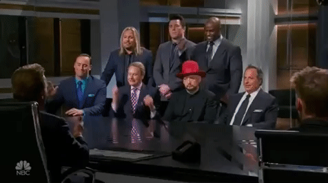 The sharks from shark tank all together in a meeting